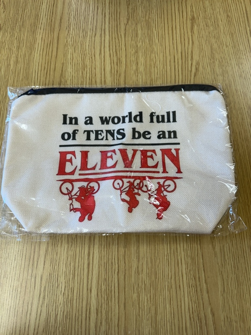 Stranger Things White "In a world full of TENS be an ELEVEN" Zip Pouch Bag